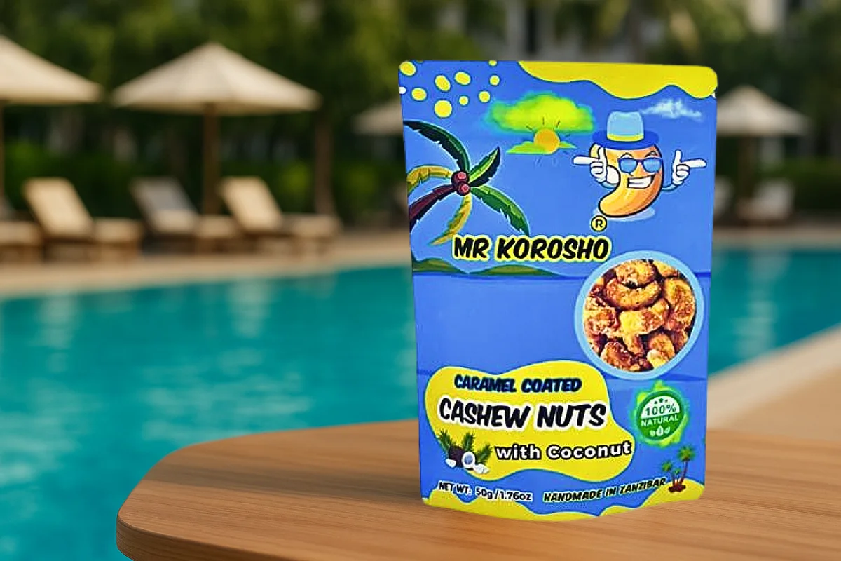 Mr Korosho Caramel Coconut cashew pouch beside a resort pool