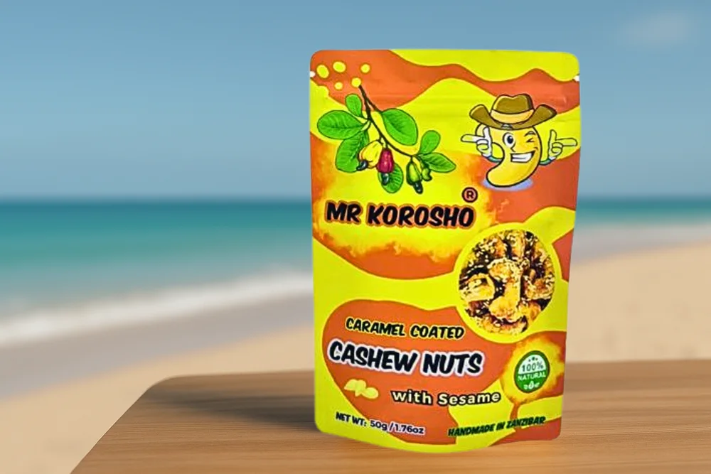 Mr Korosho Caramel Coconut cashew pouch on a Zanzibar beach